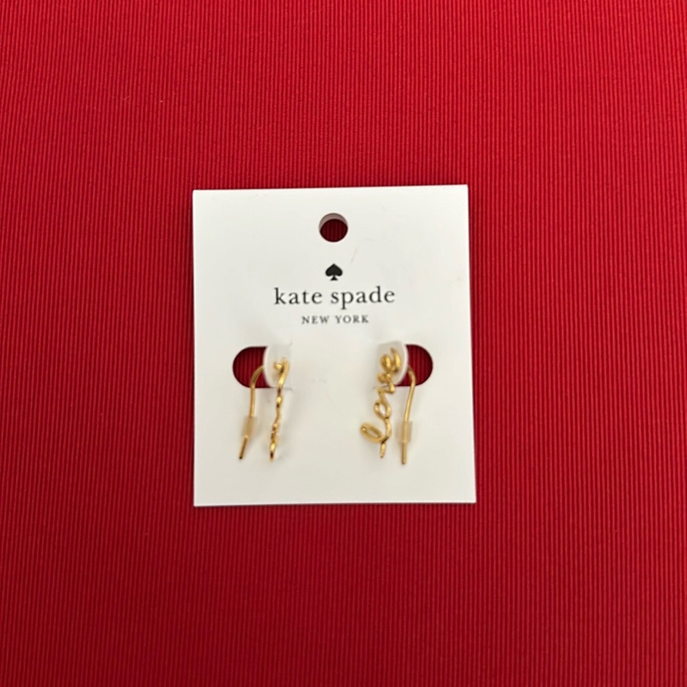 New (NWT) never worn Kate Spade gold Love hook earrings.